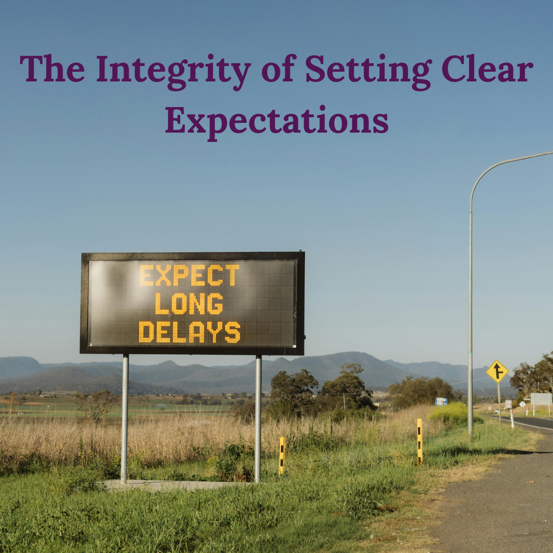 The Integrity of Setting Clear Expectations. Temporary road sign with text "Expect Long Delays" in a grassy field alongside a roadway.
